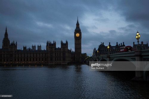 LONDON, ENGLAND - MAY 07:   Lights shine on the bridge towards Big Ben and The Houses of Parliament 