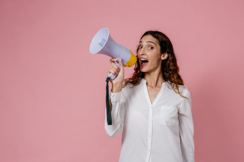 Photo by Pavel Danilyuk from Pexels
https://www.pexels.com/photo/woman-in-white-button-up-long-sleeve-shirt-holding-a-megaphone-8638300/